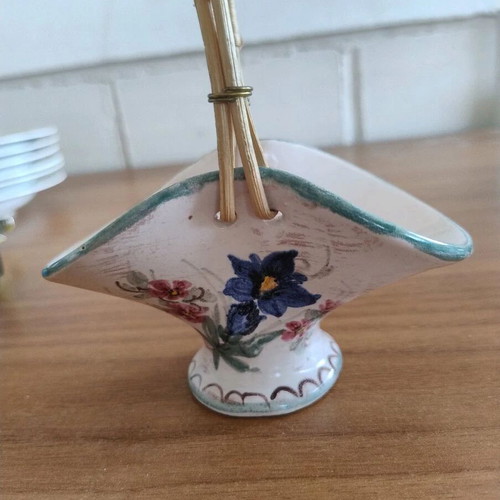 Decorative small ceramic basket used with wear marks