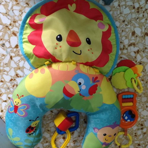 Activity Pillow for Babies like new with hanging toys