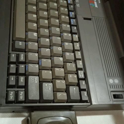Texas Instruments vintage laptop used, 1980s with charger and mouse