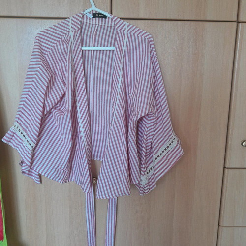 Wrap top used size Large striped pink with knitted details