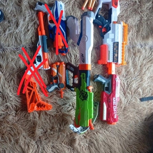 Nerf set of 4, 3 in perfect condition, red mega slightly broken