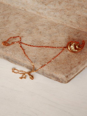 Handmade necklace with gold chain and rhinestone element