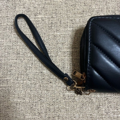 Black clutch wallet like new with wrist strap