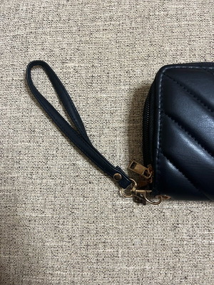 Black clutch wallet like new with wrist strap