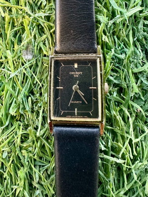 Vintage Orient quartz women's watch refurbished with black strap