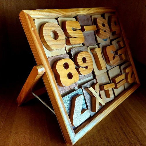 Educational game letters & numbers used, made of wood