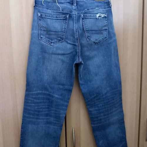 American Eagle vintage crop jeans used with knee rip