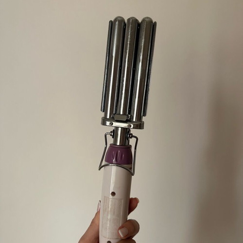 Triple hair curler used for wavy hair