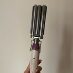 Triple hair curler used for wavy hair