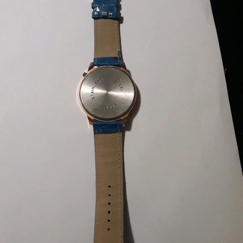 Women's wristwatch with rhinestones and blue straps used
