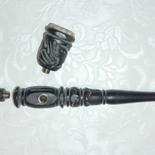 Handmade carved wooden pipe with stone inlay