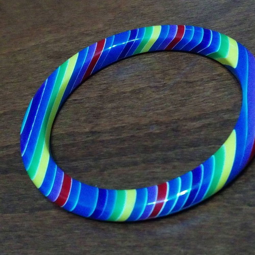 Set of 7 used neon rainbow resin bracelets 70s style