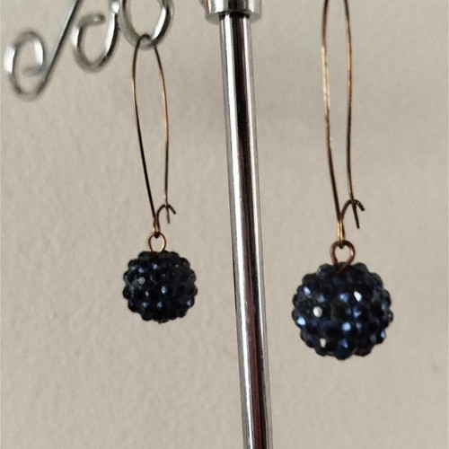 Earrings used with blue crystal balls