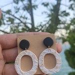 Earrings new, polymer clay with black, white, and gold colors