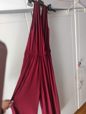 Red one-piece jumpsuit like new with pleated bottom