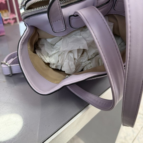 Backpack lilac color like new with 3 large compartments