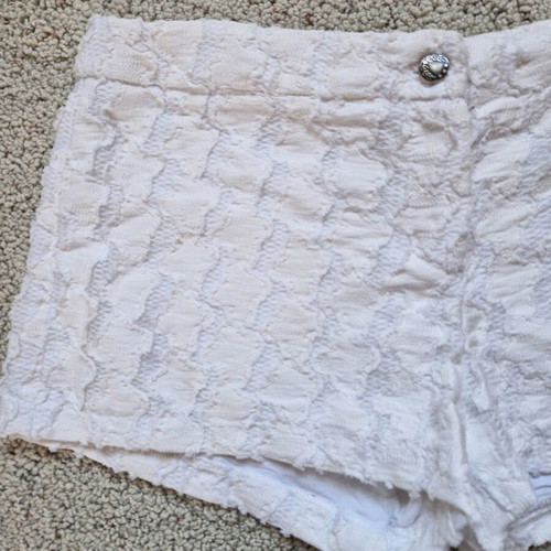 B.young white shorts size L like new with lining