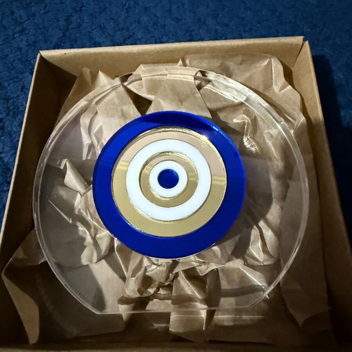 Decorative charm new, closed in its box