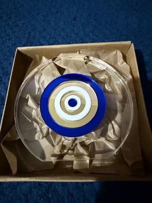 Decorative charm new, closed in its box