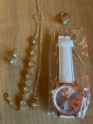 Watch new with gift items shown in the photo