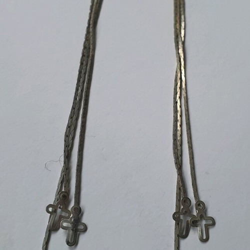 Long dangling earrings with small crosses