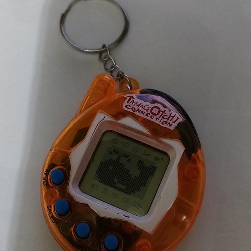 Tamagotchi Connection Orange Transparent like new