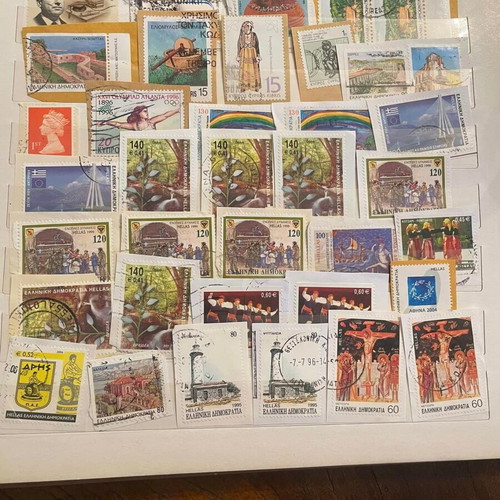 Stamp collection used with album, over 500 pieces