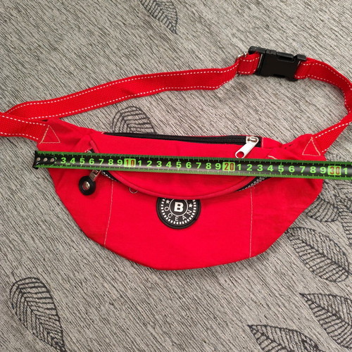 Red waist bag like new with 3 compartments