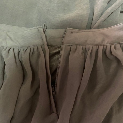 Long airy skirt used, size small, sand color with front slit