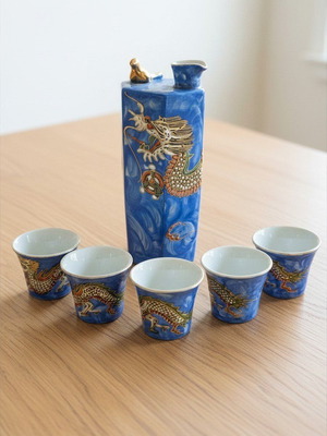 Japanese porcelain set with whistling pitcher and 5 cups like new