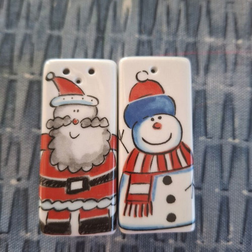 Salt and pepper set with Christmas snowman and Santa theme like new