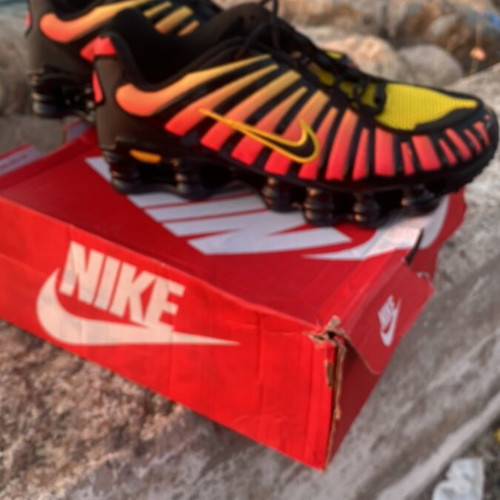 Nike Shox athletic shoes new, size 45, red and yellow