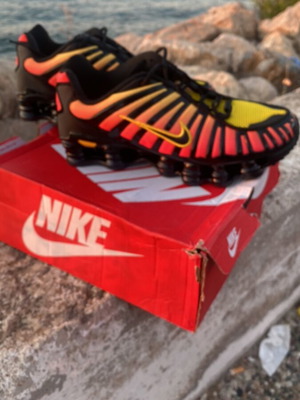 Nike Shox athletic shoes new, size 45, red and yellow