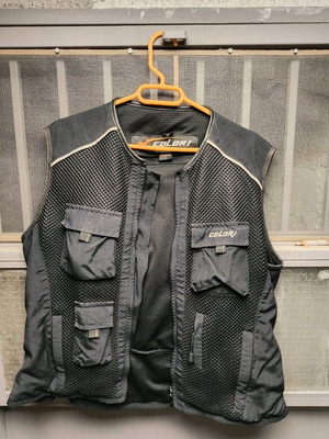 Colori motorcycle vest like new with pockets and back protection