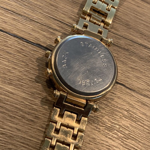 Golden wristwatch, women's