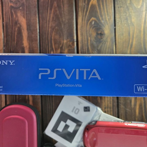 Sony PlayStation Vita PCH-1000 Cosmic Red console