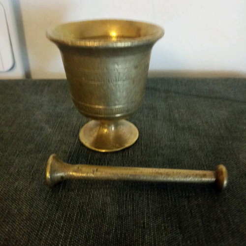 Small bronze mortar with pestle used, late 1940s