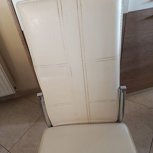 Set of 4 beige dining chairs with leatherette upholstery