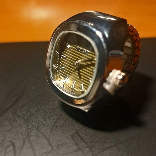 Ring watch with khaki dial and silver bracelet like new