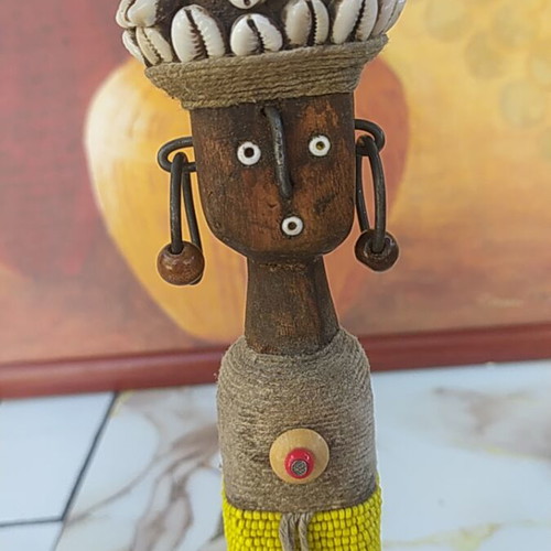 Namji African fertility doll handmade with wood, shells, cowrie, and yellow beads