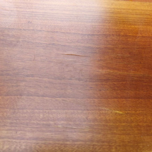 Wooden extendable round dining table used