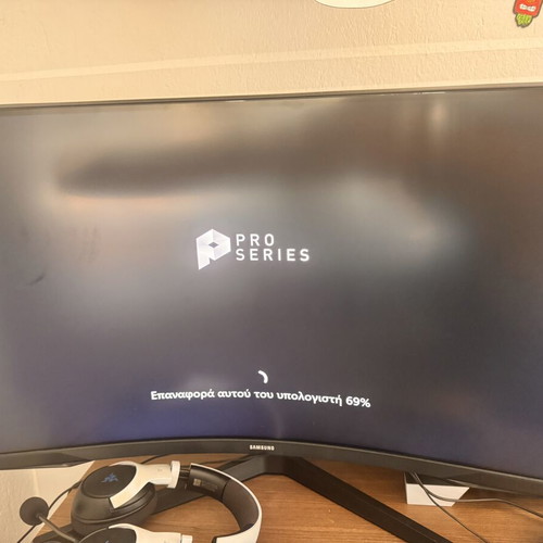Gaming computer with Samsung Odyssey 30 inch monitor, Razer Kaira headset, Logitech controller