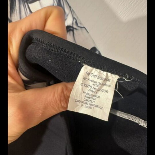 Neoprene swimsuit like new, size xsmall, for cold water sports