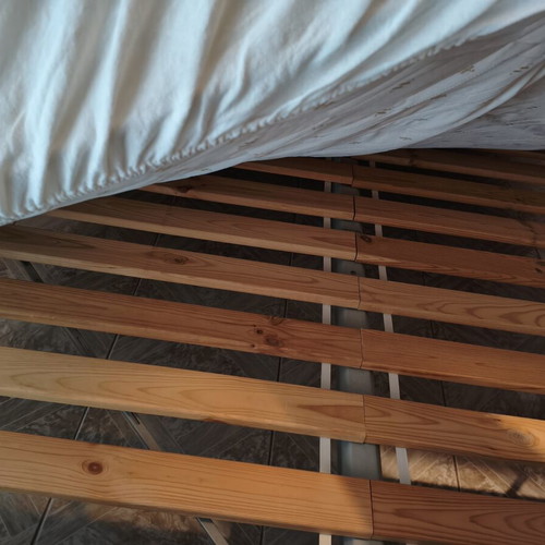 Complete dark wood bedroom set with double bed and bedside table