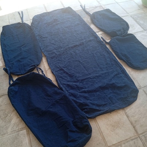 Set of cushion covers like new, dark blue with embossed design