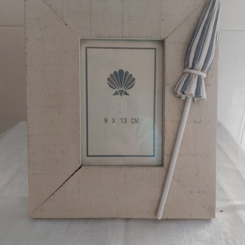 Large wooden frame with handmade umbrella decor like new
