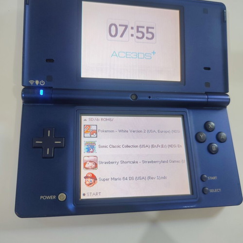 Nintendo DSi handheld console with Pokemon HeartGold game
