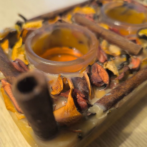 Handmade rectangular candle with aromatic potpourri like new