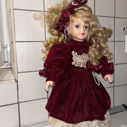 Porcelain doll Victorian style with burgundy velvet dress like new