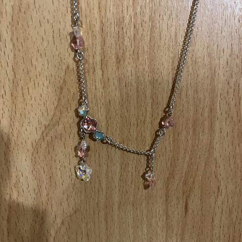 Swarovski necklace with flowers like new, silver color